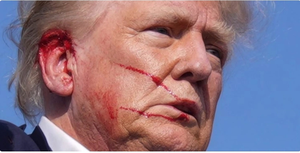 The man who photographed a bloodied and defiant Trump says he ‘knew it was a moment in American history that had to be documented’