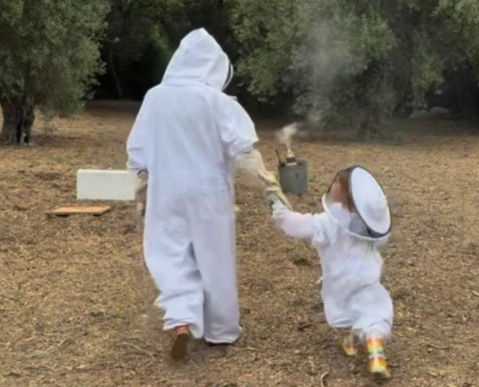 Meghan Markle shares rare video of daughter Lilibet BEEKEEPING as pair don adorable matching outfits