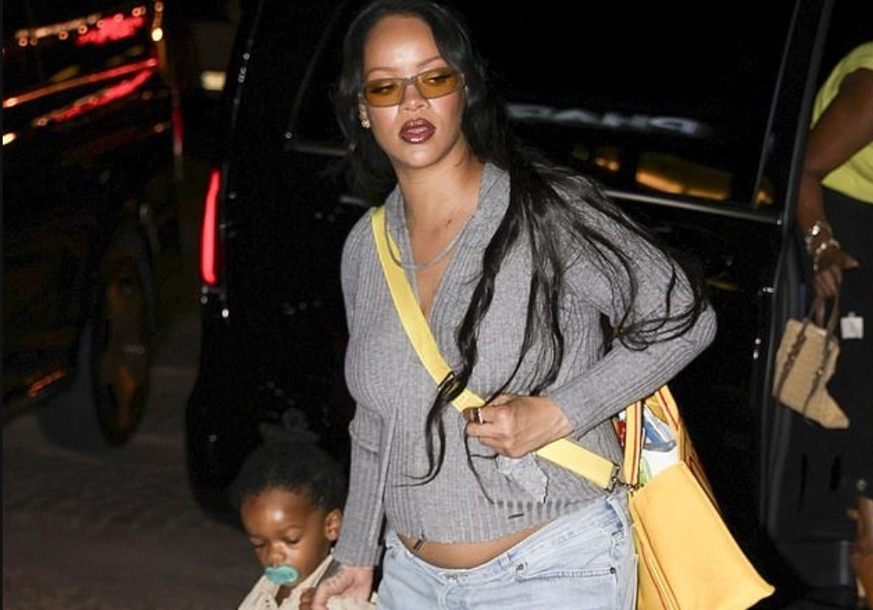 Pregnant Rihanna wears low-slung baggy jeans for dinner in Paris