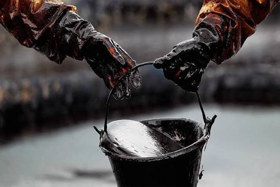 Oil set for third monthly decline as strong dollar weighs