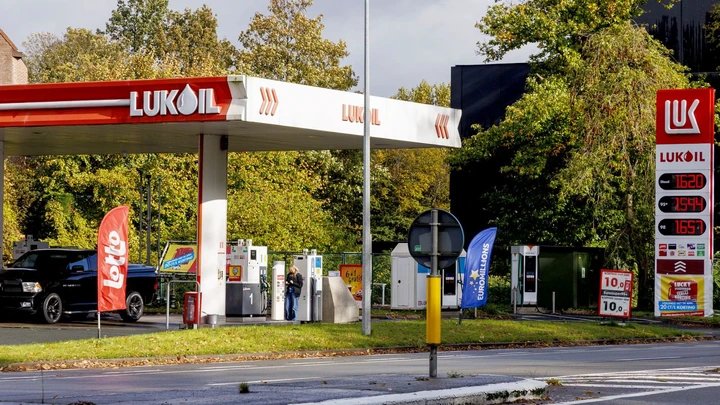 Crushed by punishing US sanctions, Russia’s Lukoil sells its international business.