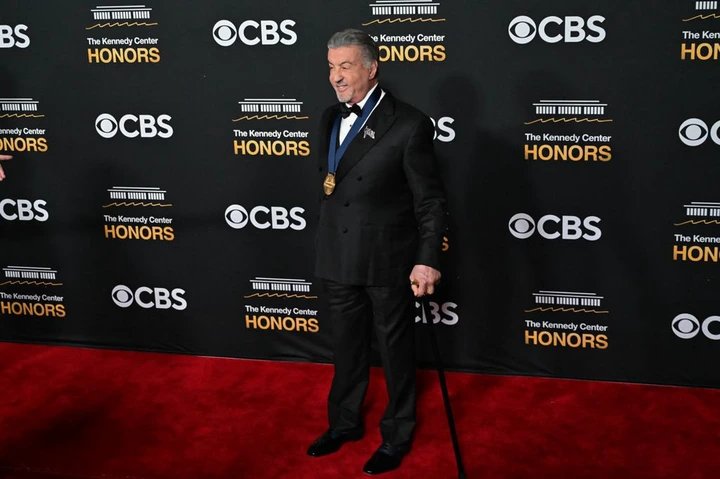 Rocky star Sylvester Stallone, 79, uses cane in public for first time during award ceremony