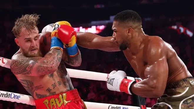Anthony Joshua defeats Jake Paul in sixth round of Miami fight.