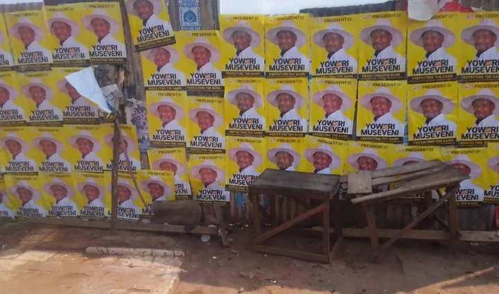 NRM Covers Opposition Posters with Museveni’s in Kawempe, Nansana