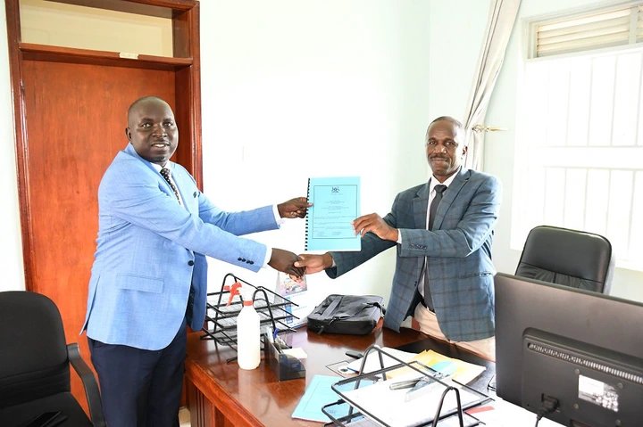 Kiryandongo Deputy CAO hands over office after transfer to Kisoro