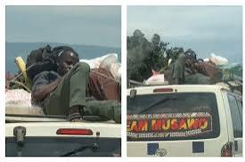 Driver arrested for transporting passenger on taxi roof