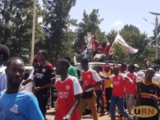 Traffic Paralyzed as Arsenal Fans Parade Replica Trophy in Jinja City
