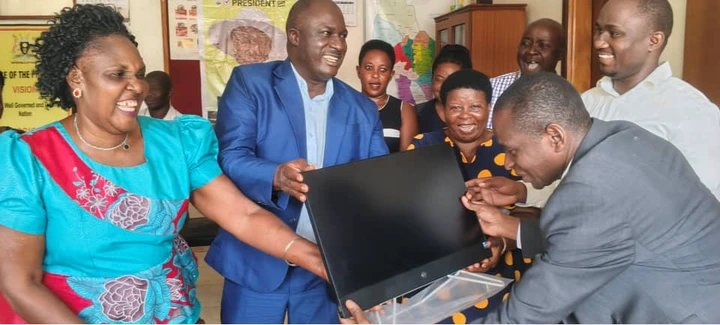 Ambassador Kizige Donates Computer to Boost Land Registration Services in Kamuli