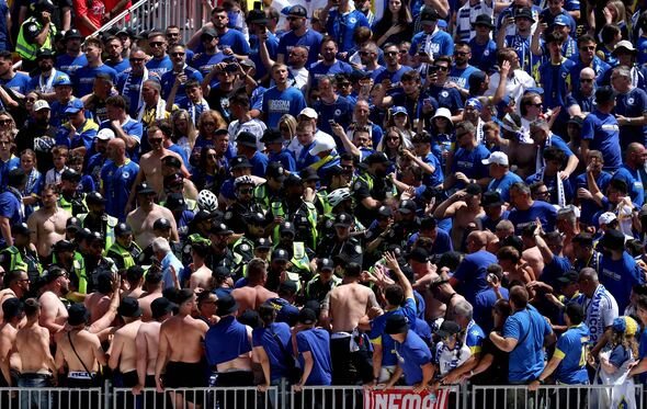 World Cup fans arrested after police officers 'injured' minutes before match