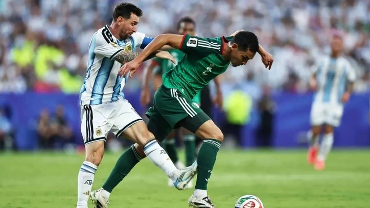 Fans claim World Cup is ‘rigged’ after Lionel Messi escapes ‘obvious red card’ after nasty challenge on Algeria star