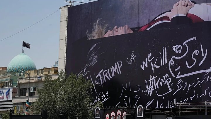 Iran displays new banner showing Trump lying in casket in central Tehran