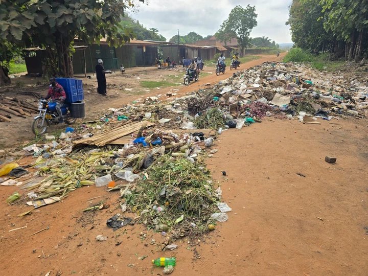 Adjumani: Awindiri Market Traders Dump Garbage on Road Over Delayed Collection